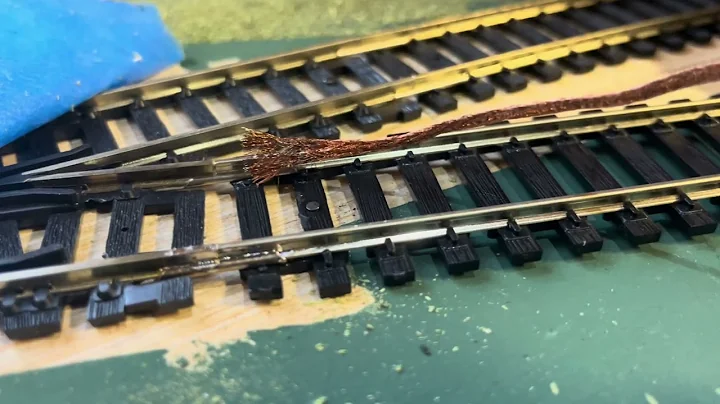 Removing excess solder from rail joiners