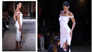 Dress sprayed onto Bella Hadid on Coperni runway at Paris Fashion Week