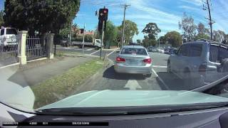 Idiot turning from wrong lane gets flashed by red light camera screenshot 5