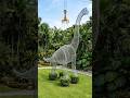 This Garden Built a Giant Dinosaur… Wait for It 🤯#gardendesign #landscaping #gardenart #dinosaur