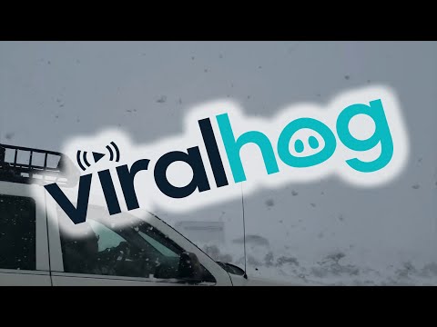 Snowstorm Leads to Huge Pileup on Icy Highway || ViralHog