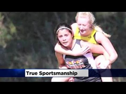 North Dakota Runner Carries Injured Opponent On Her Back