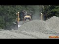 4K| CAT D6T LGP Pushing Out Gravel Piles