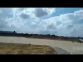 Greek f16 in extreme low flight cutting the grass