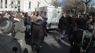 Ambulance drives through 2A protesters. Take notes.