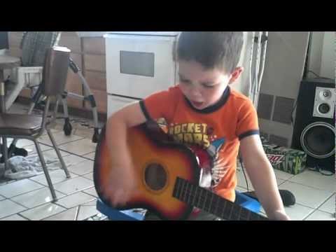 4-yr-old-playing-guitar