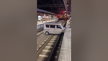 Unbelievable Train Crash Moment: Car Smashes into Sidewalk, Train Approaching!