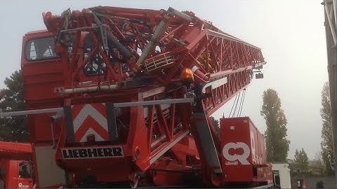 Assembling and operating telescopic crawler crane XCMG of China. The Liebherr Mobile Crane In Action