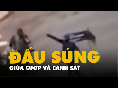 Video Đấu súng hơn 2 tiếng để cướp ngân hàng, tiền rơi vãi... - youtube