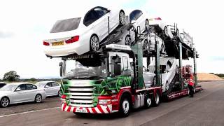 Loading Eddie Stobart Transporter with 11 brand new BMWs