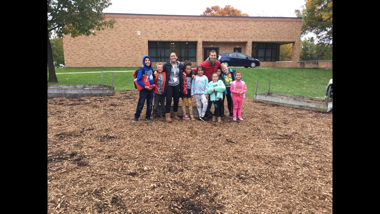 Oriole Park Elementary school gardensoil, garlic, pea planting and