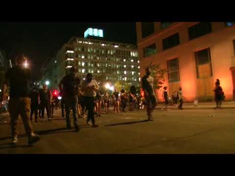 Protests against police violence continue after dark in Washington, D.C.