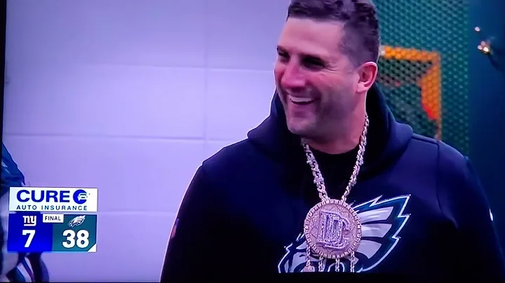 Eagles Coach wearing a Meek Mill Dream Chasers cha...