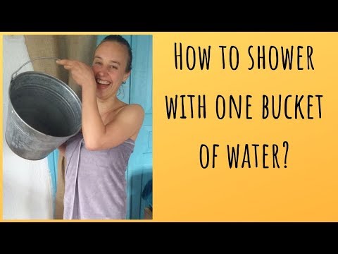 Demonstration: How a bucket makes a great shower in the Kalahari