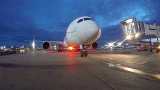 Ramp Agent POV early morning 787 offload