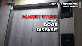 EPIC FAIL  DOOR DISEASE and ALMOST STUCK in a Mitsubishi Elevator!