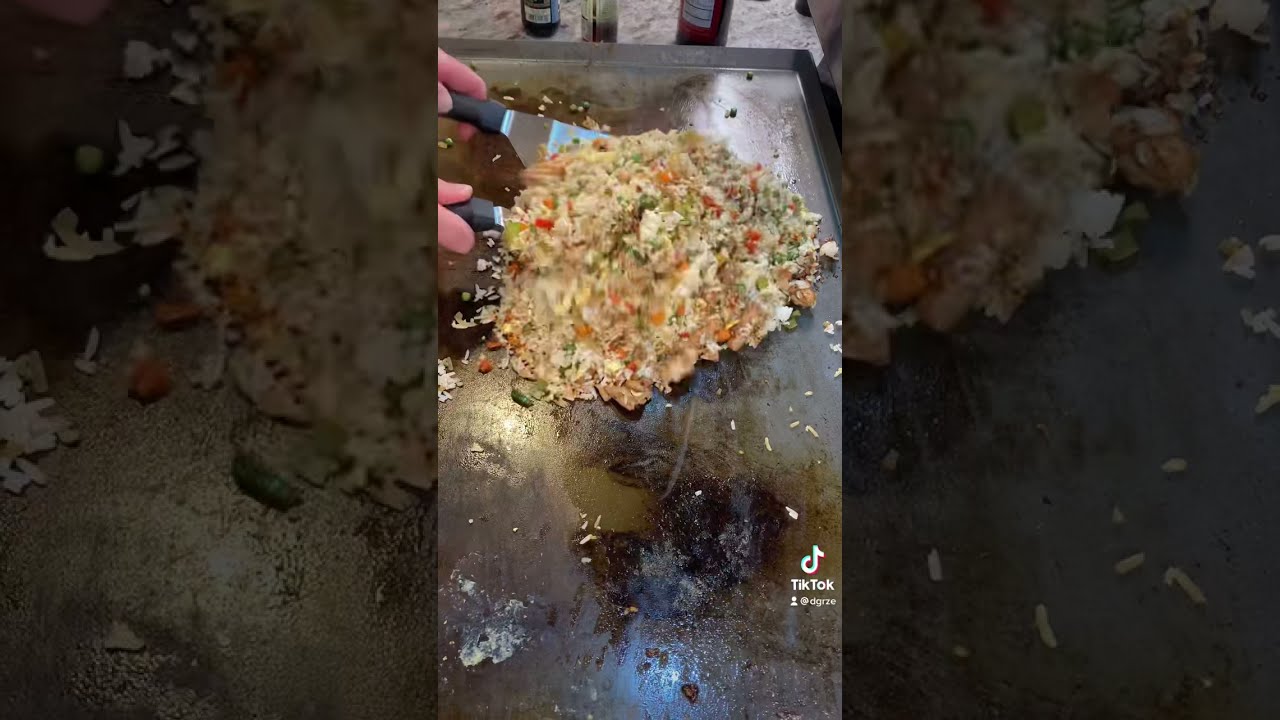 Hibachi style chicken fried rice on Steelmade USA flat Iron grill