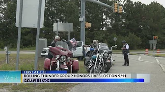 Group lines Myrtle Beach bridge with American flags to remember 9/11 fallen thumbnail