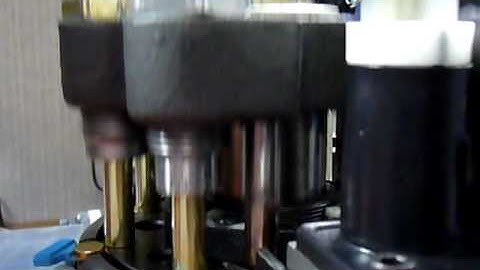 Dillon Super 1050 with PW Autodrive and Mr. Bulletfeeder,   Bullet feeder.