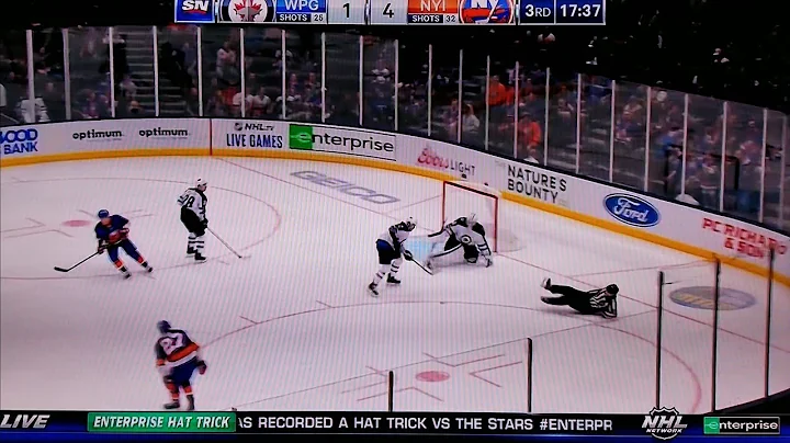 NHL Referee Jon McIsaac hit by errant shot