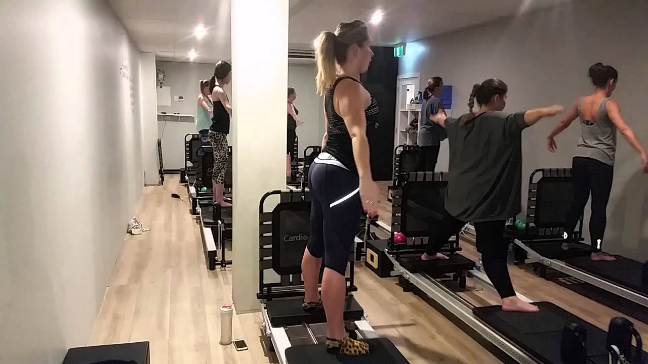 Standing Leg Slides in Pilates Reformer Lane Cove at Soulful Fitness