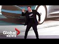 Elon Musk shows off bizarre dance moves at Tesla event in China