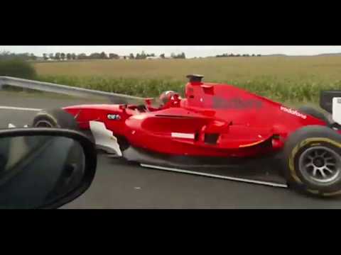 Insane footage! F1 car ( is it a Ferrari !? ) on public highway!