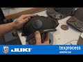 Sewing on hat patches with juki at tex process 2022  leatherseatscom