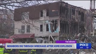 Neighbors dig through wreckage after home explosion