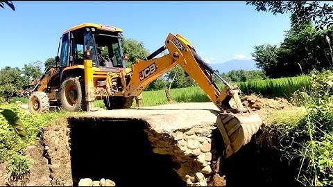 JCB Backhoe 3DX Loader Breaking Old Concrete Bridge