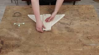 Flat diaper folding - Airplane fold