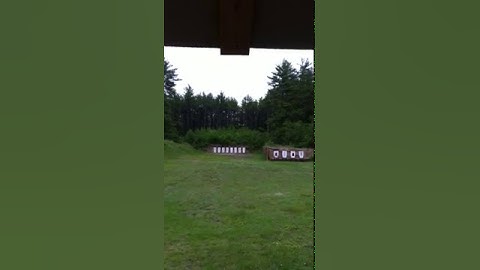 Shooting exploding target at gun range