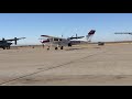 Cessna 206 turbo stationair pulling up to the pumps at Coolidge