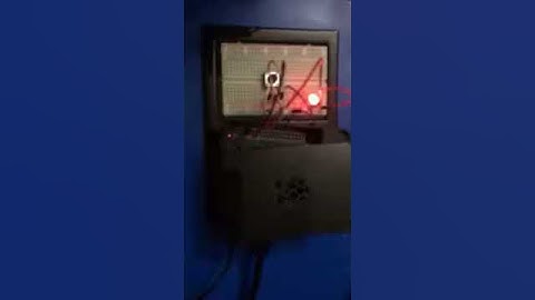 LED controlled by push button with Raspberry PI