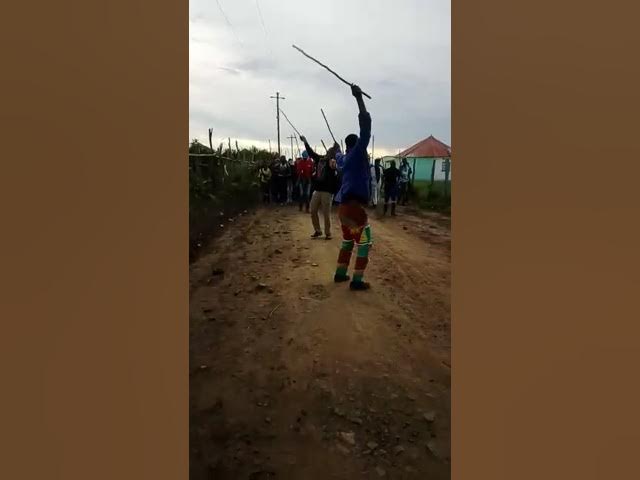 xhosa-walking-fighting-sticks-izinduku-amabhunguza – RENATURED