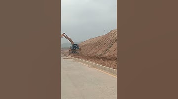 Slope Embankment cutting with Excevator and dumper