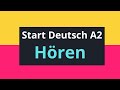 Start Deutsch 2  Modelltest - Hörverstehen mit Lösungen