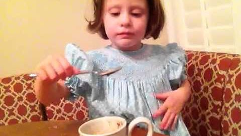 Ruby drinks hot chocolate