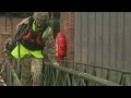 British soldiers build bridge to flooded pumping station