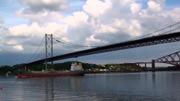 June Video Cargo Ship Passing Under Forth Road Bridge Scotland
