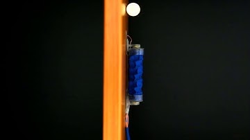 Vacuum-powered Fabric-based Soft Robotic Worm: Climbing Vertical Wall