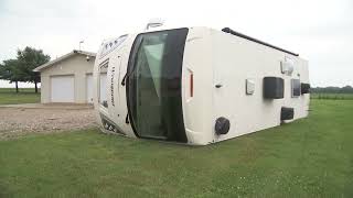 Ohio storm flips vehicles and damages homes
