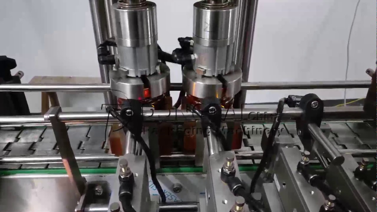 Automatic vacuum capping machine for glass bottle - YouTube