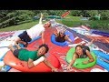 World's Biggest Giant 8ft Water Balloon Waterslide Challenge!!