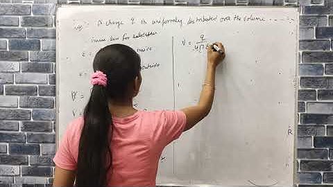 a charge q is uniformly distributed over the volume of a sphere of radius R