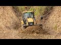JCB Backhoe Loader-Clearing Soil after Excavator's Work