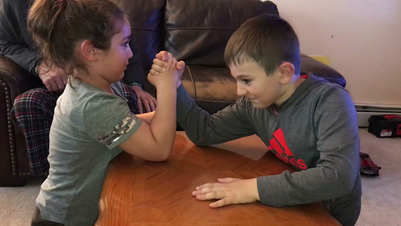 Kevin 5 years & Sara 4 years arm wrestling