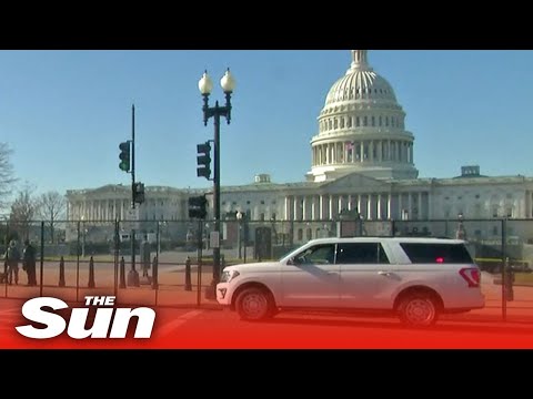 Live: Fencing is installed to protect US Capitol after violence