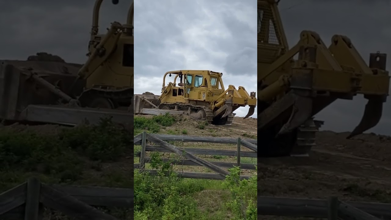 Cleaning up the hillside. Pushing the dirt into a pit at the top. 