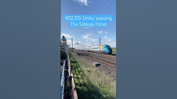 TPE Class 802 passing The Sidings Hotel